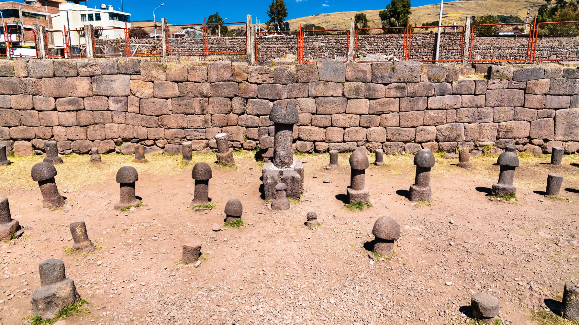 Stone phallic sculptures inside the Inca Uyo Fertility Temple at the main square of Chucuito, Puno.
